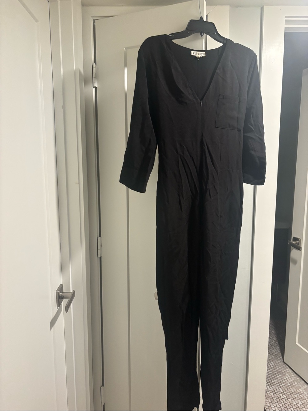 Black V-Neck Jumpsuit by Neon Rose